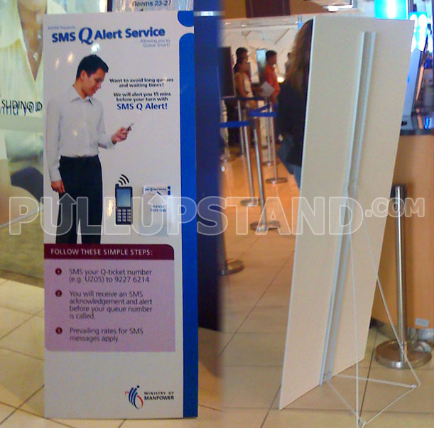 Trade show booth featuring multiple foamboard standees with product information and brand messaging